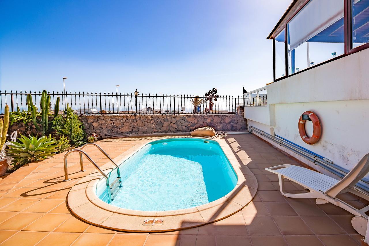 Villa Tías Екстериор снимка